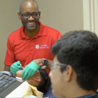 dr. jackson smiling with patient